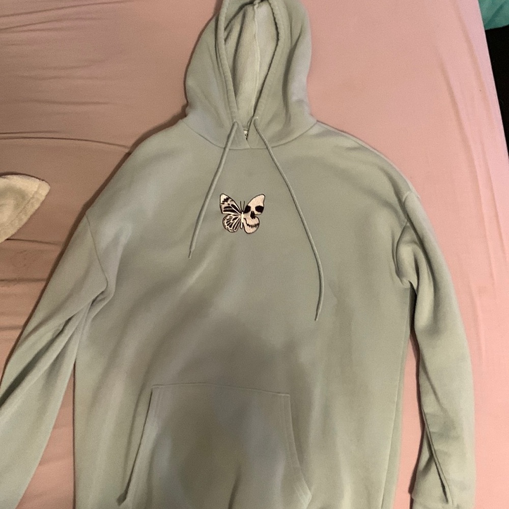 Soft hoodie, baggy, and very comfortable.